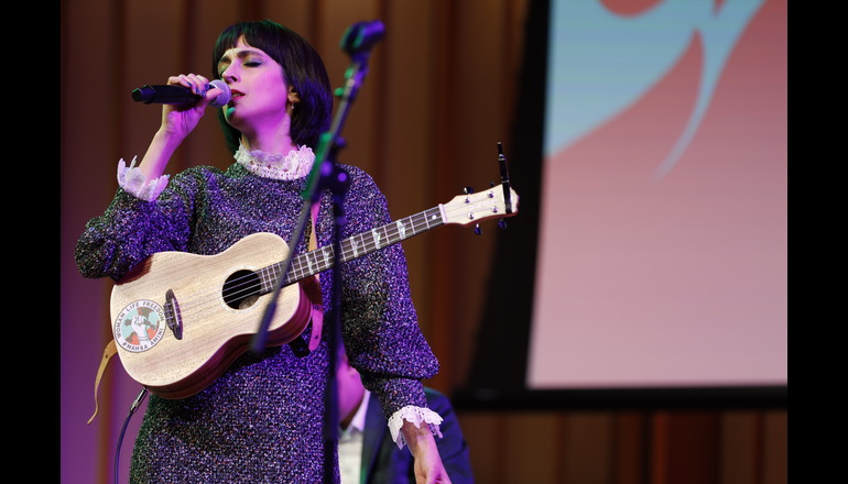 Image of Marjan Farsad singing onstage